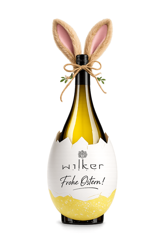 wilker-osterei-1024 Wilker Weinflasche mit Plüschosterhasenohren am Flaschenhals und einem übergroßen aufgeschlagenen Ein um den unteren Teil der Flasche